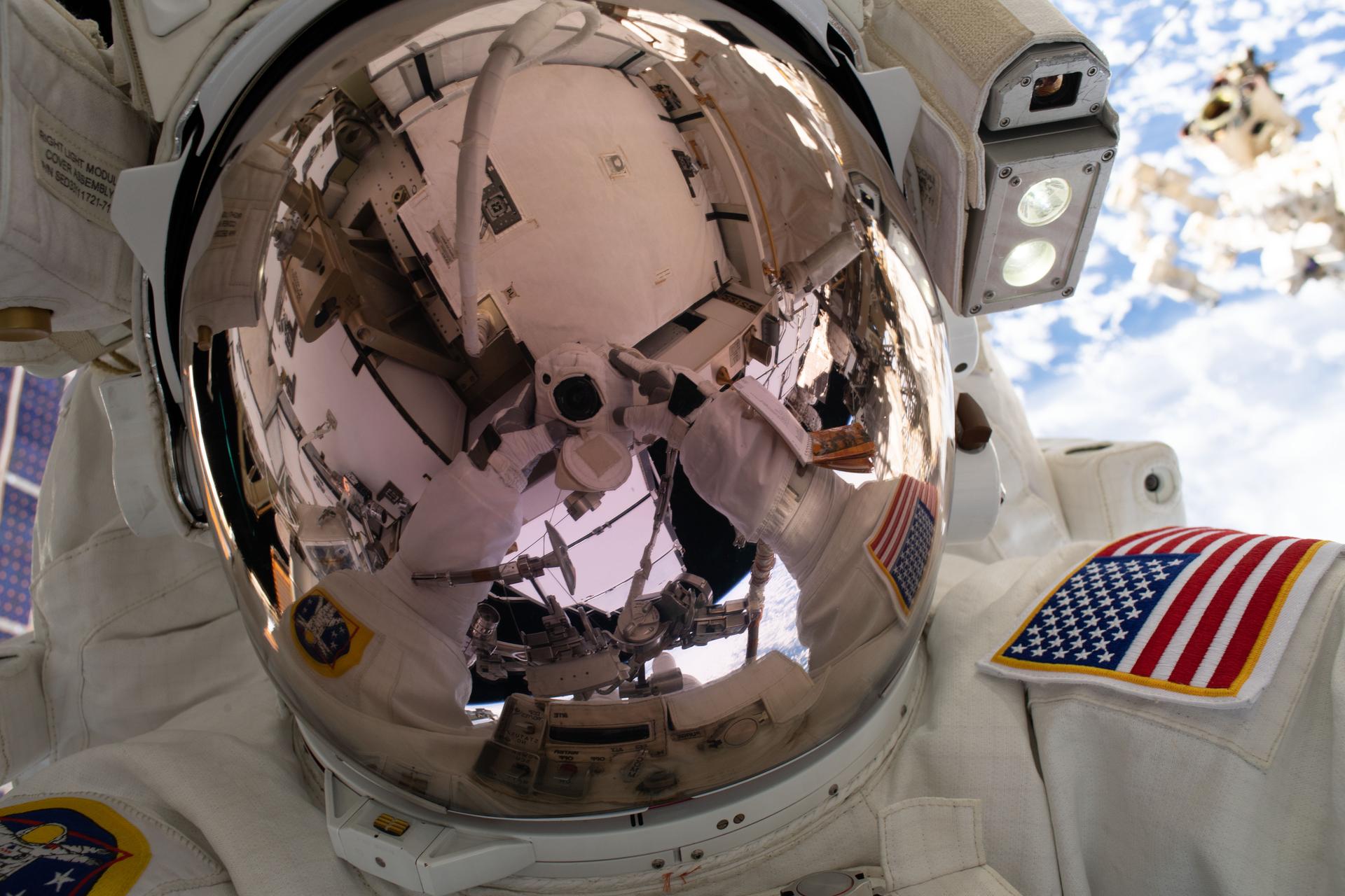 NASA astronaut spacewalk above Earth